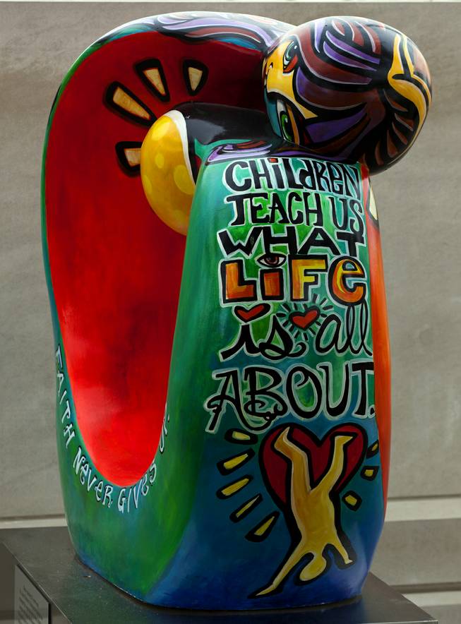 Artist Jennifer Main created this piece "Let The Children Teach Us" for the St. Jude Las Vegas Local Chapter unveiling of their new 2014 Sculpture Collection titled "Celebration of Life" at The Smith Center on Thursday, March 06, 2014.